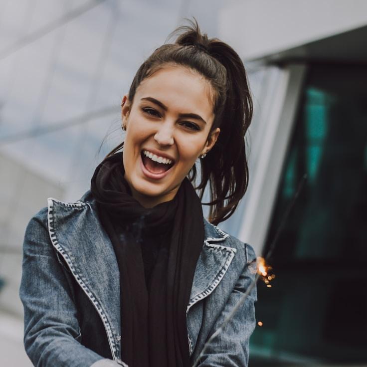 Alex Rivera, Lead Design Curator at Garden Quill Harbor, reviewing corporate floral arrangements